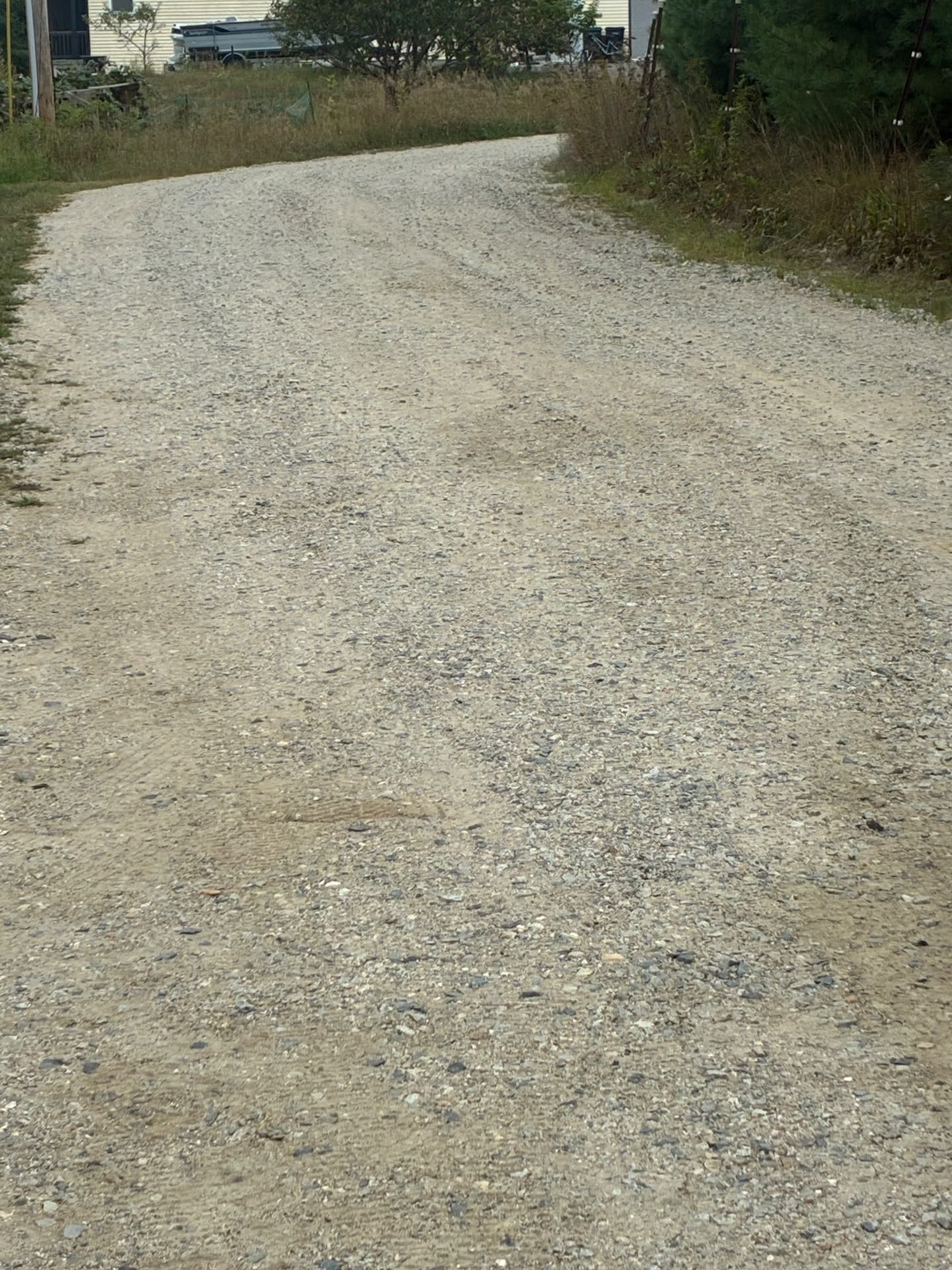 Close-up of the finished gravel surface on a new driveway